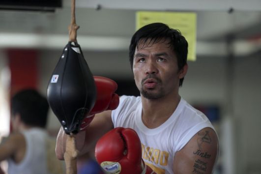 Manny Pacquiao’s Top Rank rights row ‘resolved’