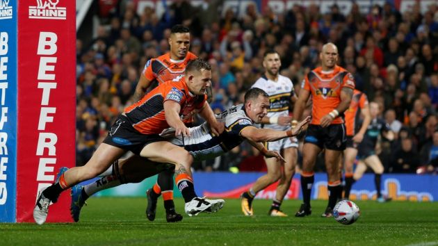 Super League lands double deal